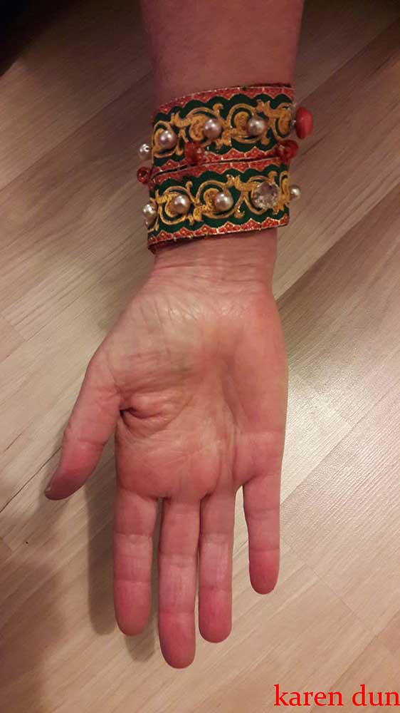 from re-used fabrics buttons and beads