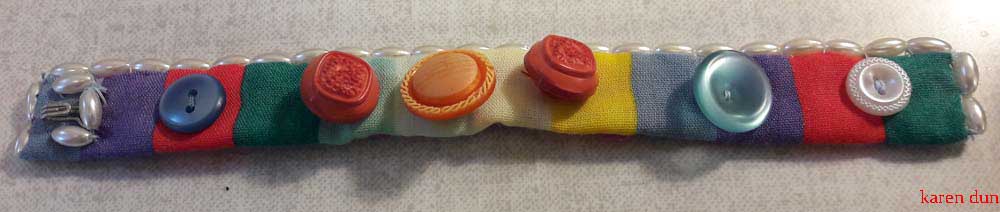 from re-used fabrics buttons and beads